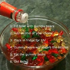 a glass bowl filled with gummy bears