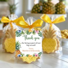 some pineapples are wrapped in plastic bags and tied with yellow ribbon to give them a thank