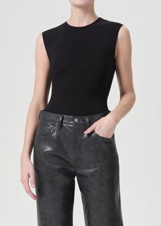 The Aura bodysuit is perfect for every day. Cut from stretch-jersey for a body-hugging fit. Wear yours with tonal tailoring.  This fit is true to size.  Looks Like: Clean, true black Feels Like: Lightweight second skin ultra-smooth elastane blend Nye Outfits, High Neck Tank, Sleeveless Bodysuit, Sport Dress, Midnight Black, Girl Body, Sleek Look, Black Sleeveless, Black Bodysuit