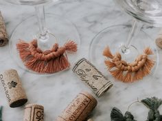 corks and wine glasses on a marble table