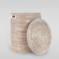 two woven baskets sitting next to each other