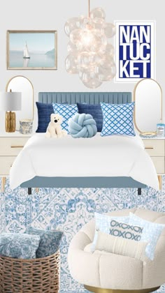 a bedroom with blue and white bedding, pictures on the wall and a teddy bear