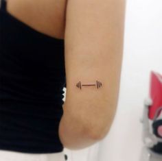 Workout Tattoo Ideas Weight Tattoo Ideas, Minimalist Barbell Tattoo, Dumbell Tattoo Women, Tiny Barbell Tattoo, Fitness Inspired Tattoos, Dumbbell Tattoo Design For Women, Small Barbell Tattoo, Weight Tattoo Fitness, Everything Works Out Tattoo