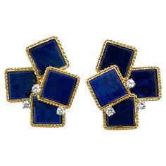 Eye-catching 18 karat gold, lapis lazuli and diamond modernist earrings, 1970s. Crafted in 18 karat yellow gold, these fabulous earrings consist of eight square lapis lazuli-set plaques in a fine frame of corded gold wire and are additionally decorated with six brilliant-cut diamonds totalling approximately 0.36 carats. They are completed by comfortable omega clip backs in 18 karat white gold. The ear clips have been recently professionally cleaned and are in very good condition. Suitable for day and evening wear. Dimensions approximately 3.0 x 2.5 cm / 1.2 x 1.0 in Maker's mark AK for Kurz AG, Switzerland Assay mark: 750 Italian marks Combined weigth: 15.2 grams Earring Video, Modernist Earrings, Yellow Gold Diamond Earrings, White Gold Diamond Earrings, Lapis Lazuli Earrings, Contemporary Earrings, Ear Clips, Gold Diamond Earrings, Yellow Gold Earring