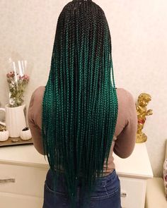 Start Your Green Hair Journey with These Stunning Ideas Dark Green Braids For Black Women, Dark Green Knotless Braids, Green Peak A Boo Hair Braids, Braided Colored Hair, Green Braids Black Women, Green Goddess Braids, Dark Green Box Braids, Multi Color Box Braids, Dark Green Braids