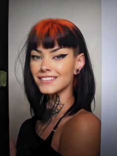 Black shoulder length haircut with orange roots, bangs above the eyebrows, and an undercut Short Hair With Bangs And Undercut, Berlin Haircut Woman, Bangs With Side Shave, Baby Bangs With Long Hair, Micro Bangs Shaved Sides, Baby Bangs Straight Hair, Bangs With Shaved Sides, Wide Bangs Hair