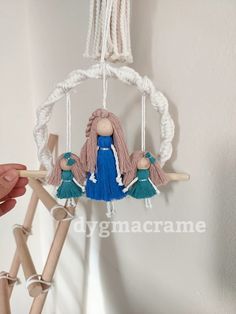 a doll hanging from the ceiling in a room