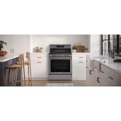 a kitchen scene with focus on the oven and counter top, along with stools