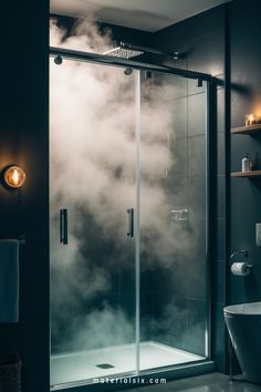 Steaming shower in a modern, dimly lit bathroom. Bathroom Ideas For Small Spaces