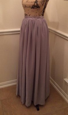 These Custom Handmade Skirts are perfect for any occasion and versatile enough to go from casual to formal. Dress it down with a denim shirt or formal with a lace top. This Gorgeous Chiffon Skirt is Soft and Flowing and can be made in ANY color, ANY length and ANY size. ALL ITEMS HANDMADE BY ME IN Pleated Chiffon Tiered Maxi Skirt, Pleated Wedding Dress With Flowy Skirt, Fitted Chiffon Skirt For Formal Occasions, Formal Fitted Chiffon Skirt, Elegant Maxi Skirt For Bridesmaid, Elegant Long Skirt For Bridesmaids, Flowy Chiffon Bridesmaid Skirt, Party Flowy Pleated Maxi Skirt, Formal Tiered Tulle Maxi Skirt