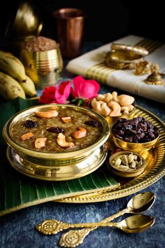 a bowl of food sitting on top of a gold plate