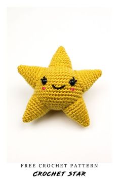 a hand holding a yellow crocheted star with black eyes and a smile on its face