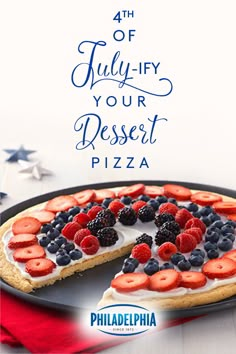 a pie with berries and blueberries on it