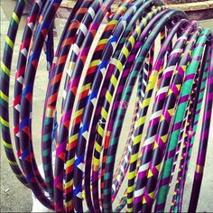 many different colored bangles are stacked on top of each other