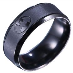 the batman symbol is engraved on this black ring