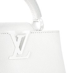 LOUIS VUITTON® - Capucines East-west Mini - Optic White White Leather Handbag, White Louis Vuitton Bag, Capucines Mini, White Louis Vuitton, Louis Vuitton Capucines, Model Features, Compact Wallet, Mini Handbag, Louis Vuitton Official