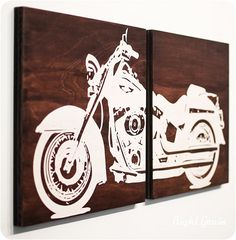 two wooden wall art pieces with motorcycles on them