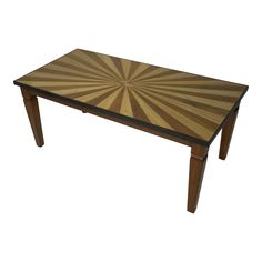 a wooden table with an abstract design on it's top and legs, against a white background