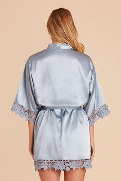 Perfect for gifting, these lacy bridesmaid robes will add a little romance to any bridal suite. Available in Dusty Blue. Lace up your bridal suite look with these gorgeous satin robes for your bridesmaids (and a white one for the bride!) | Dusty Blue Getting Ready Satin Size XL/2XL | Birdy Grey Claudine Lace Robe Bridesmaid Robes Blue, Bridal Shower Treats, Satin Robes, Wedding Roles, Birdy Grey, Beach Bride, Bridesmaid Robes, Bridal Suite, Matte Satin