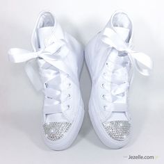 Our custom Swarovski Wedding Converse will have you twirling up the aisle in your own unique style. 🎉 You'll dazzle everyone with your brand new "Mrs." status with a sparkle that'll turn heads and make memories to last a lifetime. Bridal Converse that can be worn anywhere and for years to come will bring a smile to your face every time you look at your feet. We can create the perfect blinged out Converse for your wedding: Approximately 600 Genuine Swarovski Crystals per pair each hand-jeweled w Bedazzled Converse, Bridal Party Shoes, Converse Hi, Bridal Converse, Groomsmen Party, Converse Wedding Shoes, Bling Converse, Wedding Converse, Leather High Tops