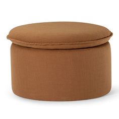 a round ottoman that is made out of fabric and has a cushion on the top