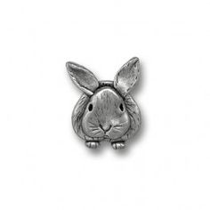 a pewed metal rabbit head on a white background with clipping for the bottom