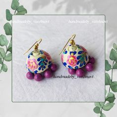 handmade terracotta jewellery, hand painted with floral theme #terracotta #jhumka #terracottajewellerydesigns #jewellerydesign #jewellery #earringshandmadebeaded #jhumki #clayart #clayjewelry #handmade #handcrafted #indianfashion #floraljewellery #floral #aesthetic #jewelryaddict #jewelrytrends #jewelrydesigner #instagram #instajewelry Jhumka Painting, Painted Jhumkas, Small Jhumka, Tiny Jewelry, Floral Aesthetic, Floral Jewellery, Floral Theme