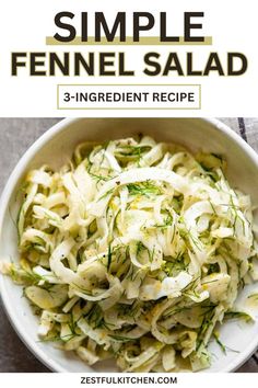 a white bowl filled with fennel salad on top of a table