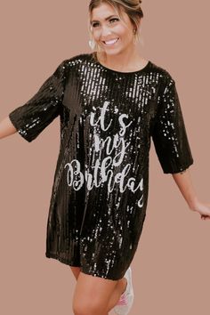 Party like it's your birthday! The It's My Birthday Sequin Dress features a round neckline, a stunning sequin design, a full lining, and the text " It's My Birthday" across the front in white. The ideal dress to accessorize and wear out on your big day! Short sleeves Round Neckline Above the knee hemline Sequin Pattern both front and back Full lining - not itchy at all Fit: oversized Fabric: 65% Polyester, 30% Cotton, 5% Spandex Imported Model Specs: Emily is wearing a size small in the photo.Ho Sequin Dresses For Bachelorette Party Season, Sequin Dress For Bachelorette Party And Party Season, Sequin Dress For Bachelorette Party, Fitted Sequin Dress With Crew Neck, Black Sequined Celebration Dress, Black Sequined Dress For Celebration, Embellished Sequin Dress For Party Season Celebrations, Black Embellished Dress For Celebration, Birthday Sequin Dress