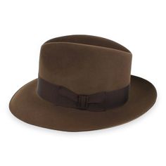 A true classic, the Woodbury is a traditional fedora made of 100% fur felt, a durable material that naturally repels water. The grosgrain ribbon hat band has been carefully dyed a deep brown to complement the Woodbury's tone-on-tone look. For two different styling options, the brim can be snapped up or down. The interior features a full satin lining and a genuine cowhide leather inner band. Made in the USA by Stetson, the Belfry Woodbury features extraordinary American craftsmanship! FEATURESSty Pork Pie Hat, Hat Size Chart, Pork Pie, Felt Fedora, Cloche Hat, Deep Brown, Felt Hat, Hat Band, Fedora Hat