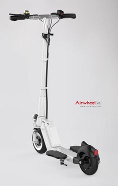 an electric scooter is shown with the seat folded back and wheels facing forward