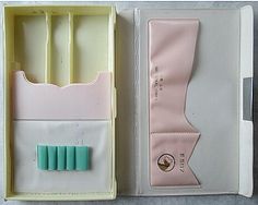 an open box with two toothbrushes in it