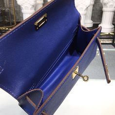 Description HRMS Mini Kelly KP Pochette Electric Blue For Women Gold Toned Hardware 8.7in/22cm Rep 1:1 Measurements: 22 x 7 x 14 cm / 8.7 x 3 x 5.5 inches (Length x Width x Height) In the 1930s, Robert Dumas, son-in-law of Émile Hermès, whom he succeeded at the head of Hermès (1951-1978), created the women’s bag with straps. He designed a trapezoid shape with two triangular gussets, a cutout flap, a handle and two side straps, and with it he brought the house into the era of boldness and moderni High-end Blue Crossbody Shoulder Bag, High-end Blue Shoulder Bag With Detachable Strap, High-end Blue Shoulder Bag For Travel, High-end Blue Shoulder Bag With Removable Pouch, Designer Blue Rectangular Case Bag, Luxury Blue Rectangular Case Shoulder Bag, Luxury Blue Rectangular Shoulder Bag, Designer Blue Shoulder Bag For Business, High-end Blue Office Bags