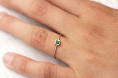 Delicate square emerald ring handcrafted in 14k gold. The emerald in this ring is natural, Earth mined gemstone. The back of the ring holds tiny heart. CENTRAL STONE: * natural, Earth mined gemstone - emerald * color: green SPECIFICATIONS: *material ring is available in 14k yellow/ rose/ white gold or 18k gold (please inquire about the price) *ring shank: approximately 1mm *size: this ring is made to order in YOUR size, please choose your size from drop down menu. *method: handmade *in the back Simple Emerald Ring, Gold Minimalist Ring, Natural Emerald Rings, Green Emerald Ring, Faceted Ring, Ring Simple, Minimalist Ring