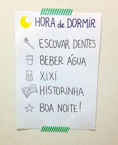 a sign posted on the side of a door that says hora de dormir