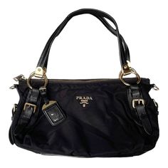 Prada Vintage - Nylon Satchel Bag Black  Good Conditions : 8/10 Made In Italy GHW This satchel features a nylon body with leather trim, rolled leather handles with belt details, a top zip closure, and interior zip and slip pockets. Measurements : Width : 14.5 inches Height : 9 inches Depth : 6.5 inches Hand Drop : 9 inches  Strap adjust  PLEASE CHECK ACTUAL SIZE CAREFULLY, NO RETURNS OR COMPLAIN FOR WRONG SIZE ACTUAL  *Shipping using Express Mail Service "will take 4 - 7 working day to arrived a Prada Bags Aesthetic, Vintage Bags Designer, Old Money Handbags, Black Luxury Bag, 90s Bags, Prada Bag Aesthetic, Prada Vintage Bag, Goth Bags, Vintage Prada Bag