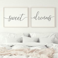 two black and white prints with the words sweet dreams on them above a bed in a bedroom