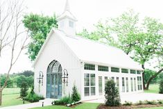 an artist's rendering of a white church