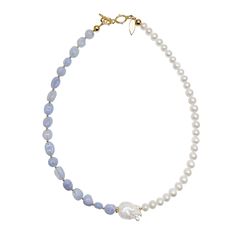 The white feshwater parls and blue lace agate short necklace is a stunning piece of jewelry that beautifully combines the soft elegance of pearls with the beautiful hues of blue lace agate. The necklace features a strand of lustrous white freshwater pearls, delicately interspersed with beautiful blue lace agate. Whether you're dressing up for a special event or just looking for a beautiful and unique piece to wear every day. With its timeless elegance and eye-catching beauty, this necklace is th Blue Pearl Necklace With Natural Stones, Luxury Blue Pearl Pendant Necklaces, Luxury Blue Pearl Pendant Necklace, Luxury Blue Necklaces With Pearl Pendant, Luxury Blue Necklace With Pearl Pendant, Blue Pearl Necklace With Pearl Chain, Blue Pearl Chain Necklace, Blue Pearl Necklace With Pearl Pendant, Luxury Blue Pearl Necklace