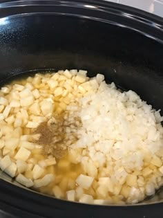 the food is being cooked in the slow cooker