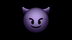 an evil looking purple ball with horns on it's head and eyes, in the dark