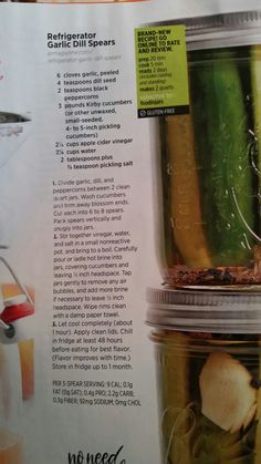 a recipe book with jars full of pickles and other ingredients in it, including garlic oil