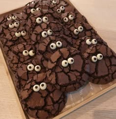 chocolate cookies with eyes and googly eyes on them