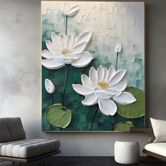 a painting with white flowers is hanging on the wall