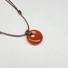 This Crystal Necklaces item by AnasDreamJewelry has 334 favorites from Etsy shoppers. Ships from Canada. Listed on Jan 21, 2024 Cord Choker, Carnelian Jewelry, Donut Shape, Carnelian Crystal, Carnelian Necklace, Carnelian Pendant, Crystal Necklaces, Belly Chain, Adjustable Necklace