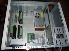 the inside of a computer case with electronic components