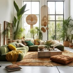 a living room filled with lots of furniture and plants on the walls, windows, and rugs