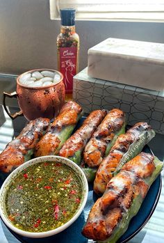 grilled corn on the cob with dipping sauce and condiments for dipping