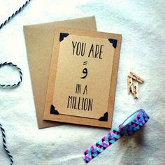 there is a card that says you are e in a million on it next to some corks