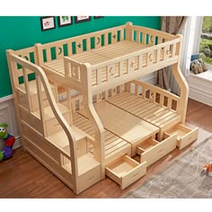 a child's wooden bunk bed with stairs